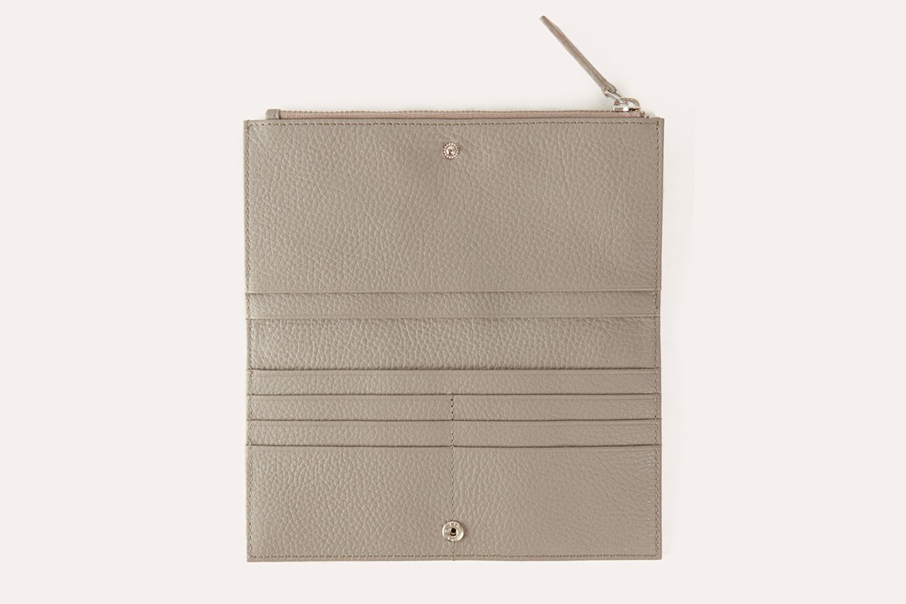 Top Zip Wallet made of genuine pebble leather with multiple card slots and a zip coin pouch.