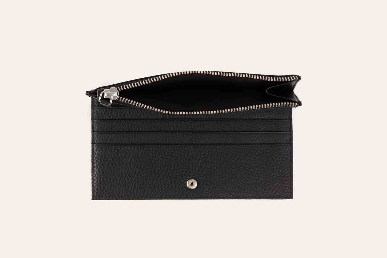 Top Zip Wallet made of genuine pebble leather with multiple card slots and a zip coin pouch.