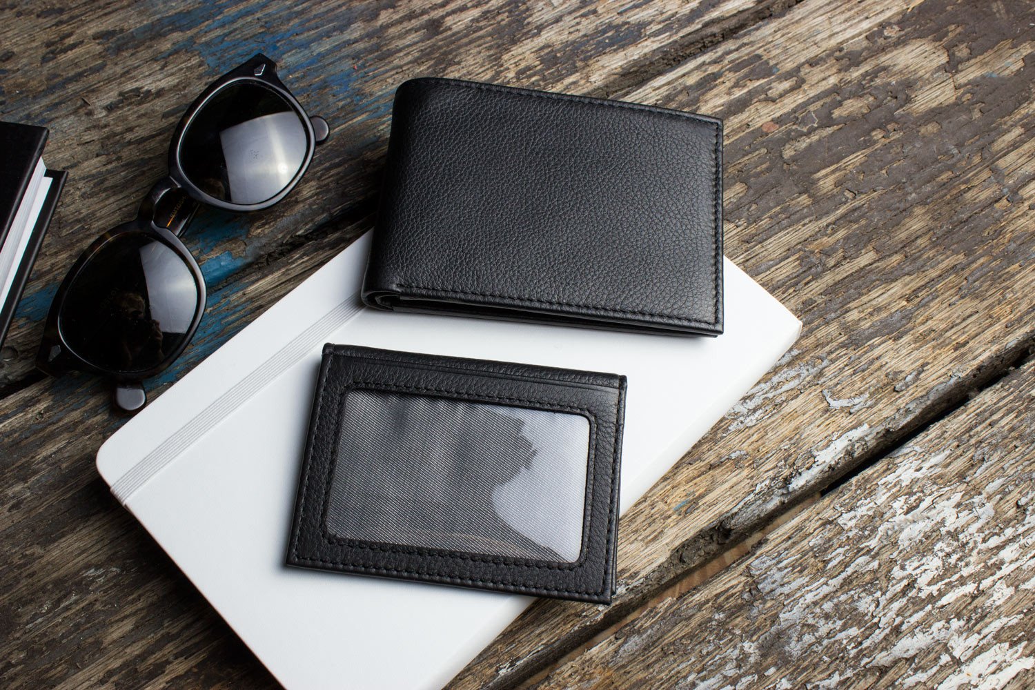 Traditional Bifold Wallet made of glove tanned cowhide leather with removable ID window and multiple card slots.