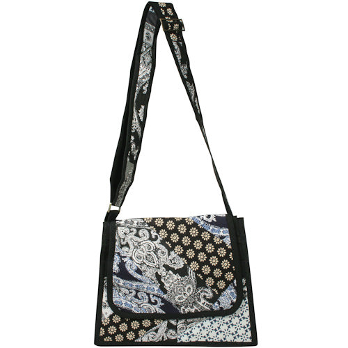 Trapezoid Patchwork Shoulder Bag with adjustable strap and multiple pockets, handmade by youth artisans in India.