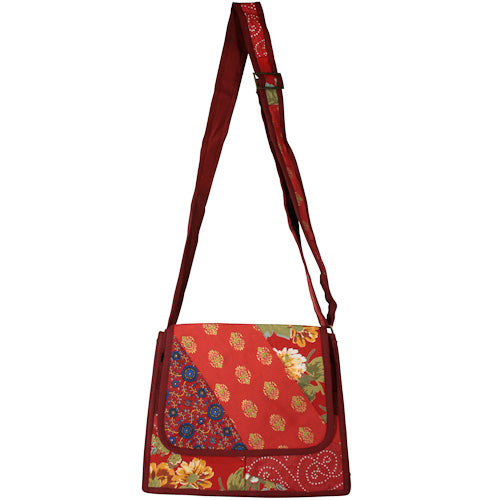 Trapezoid Patchwork Shoulder Bag with adjustable strap and multiple pockets, handmade by youth artisans in India.