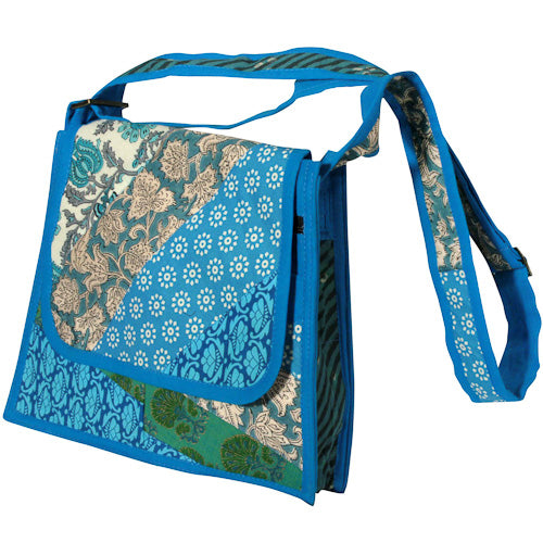 Trapezoid Patchwork Shoulder Bag with adjustable strap and multiple pockets, handmade by youth artisans in India.