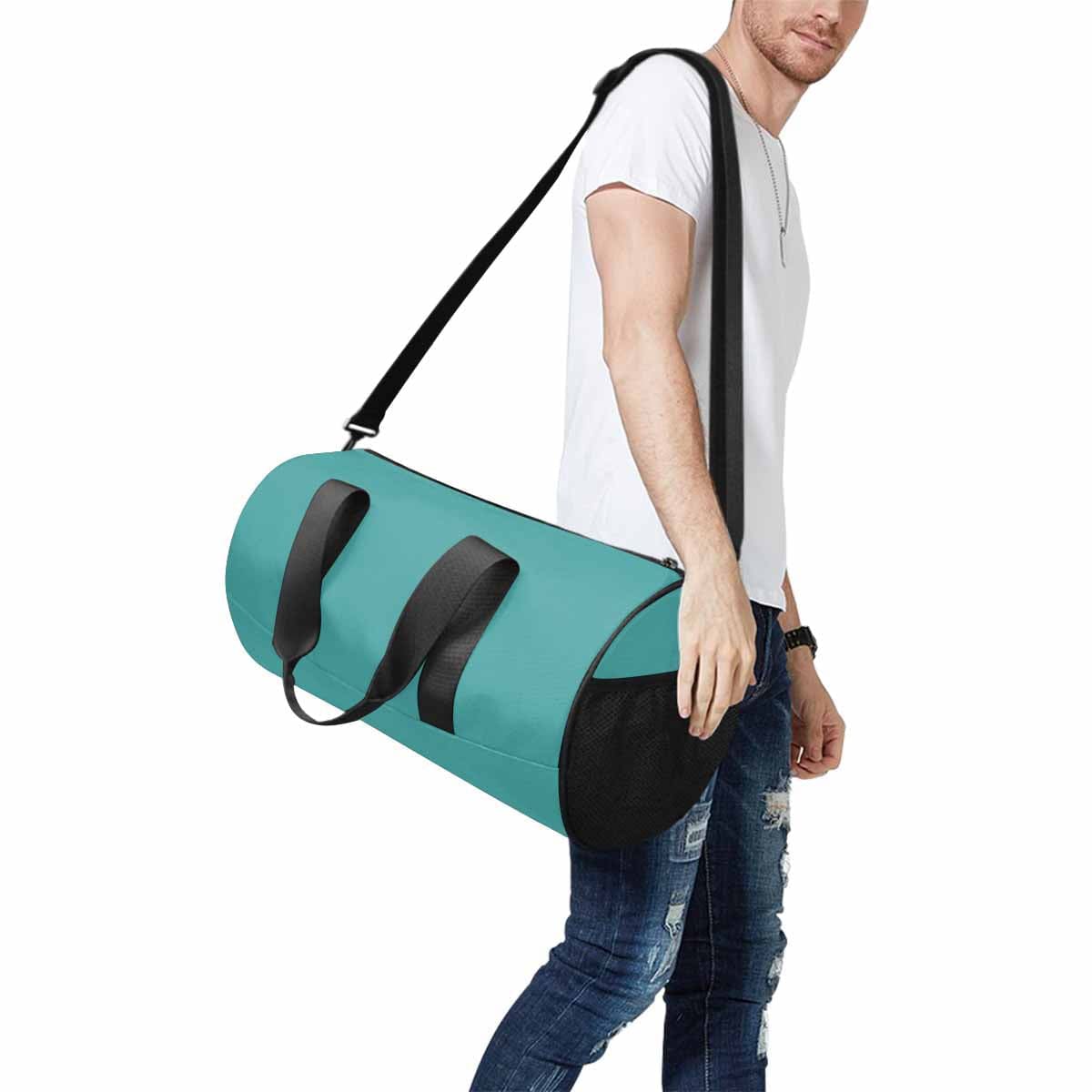 Mint Blue Travel Duffel Bag with waterproof fabric and spacious design, ideal for travel and outdoor activities.