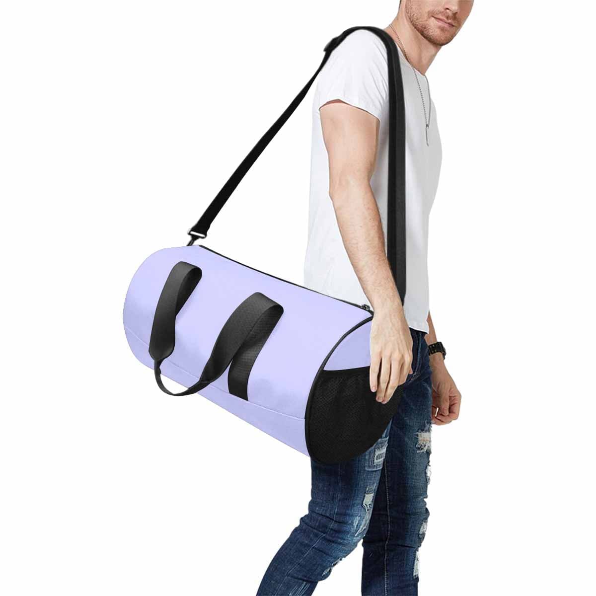 Periwinkle Purple Travel Duffel Bag with spacious compartments and adjustable strap, perfect for travel and outdoor activities.