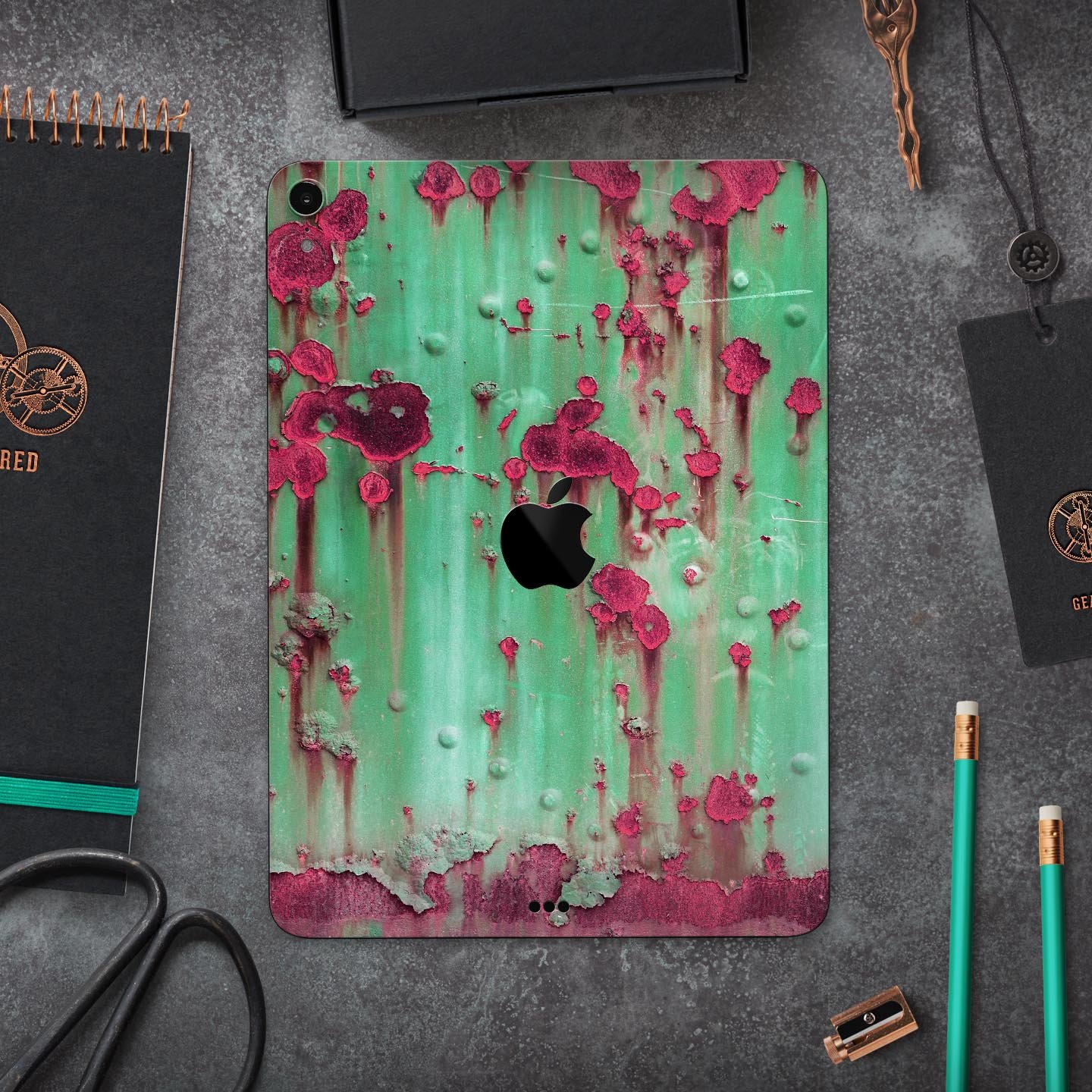 Trendy green and pink rust full body skin decal for Apple iPad, showcasing vibrant colors and sleek design.