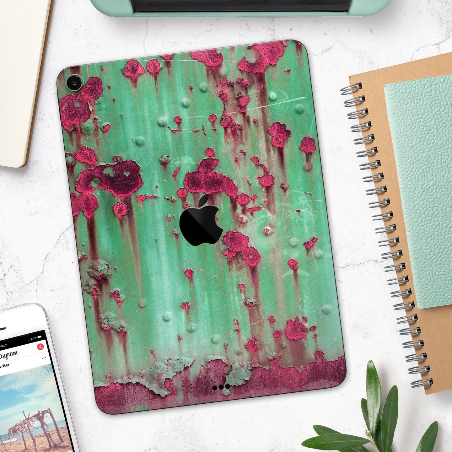 Trendy green and pink rust full body skin decal for Apple iPad, showcasing vibrant colors and sleek design.