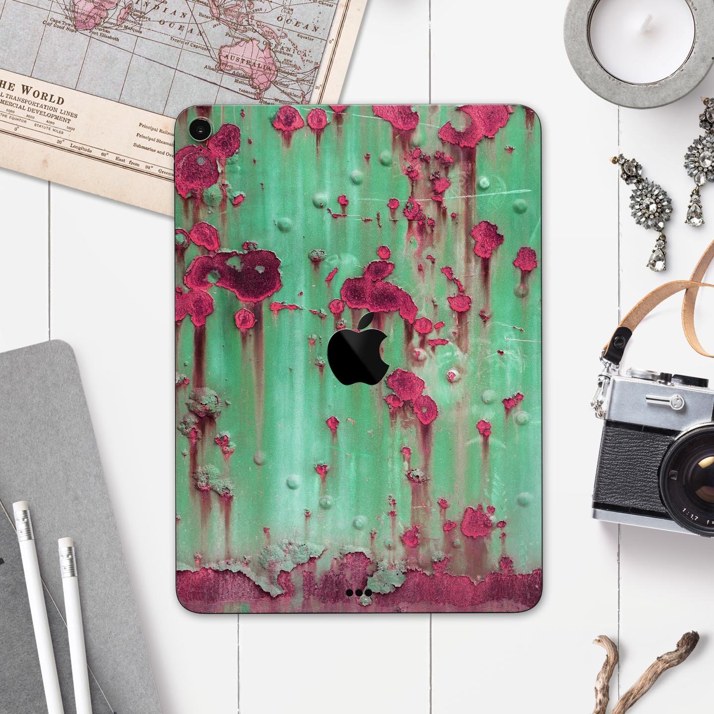 Trendy green and pink rust full body skin decal for Apple iPad, showcasing vibrant colors and sleek design.