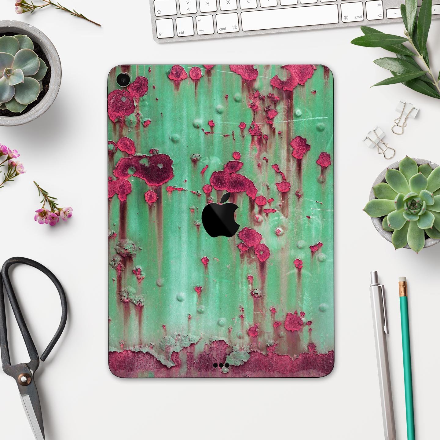 Trendy green and pink rust full body skin decal for Apple iPad, showcasing vibrant colors and sleek design.