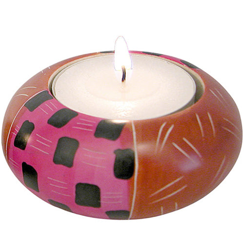 Hand-painted Tribal Soapstone Tealight Holder featuring intricate African motifs, showcasing artisan craftsmanship.