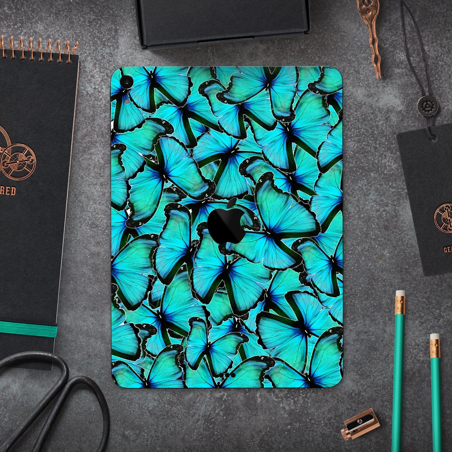 Turquoise Butterfly Bundle skin decal for Apple iPad, showcasing vibrant butterfly design and premium finish.