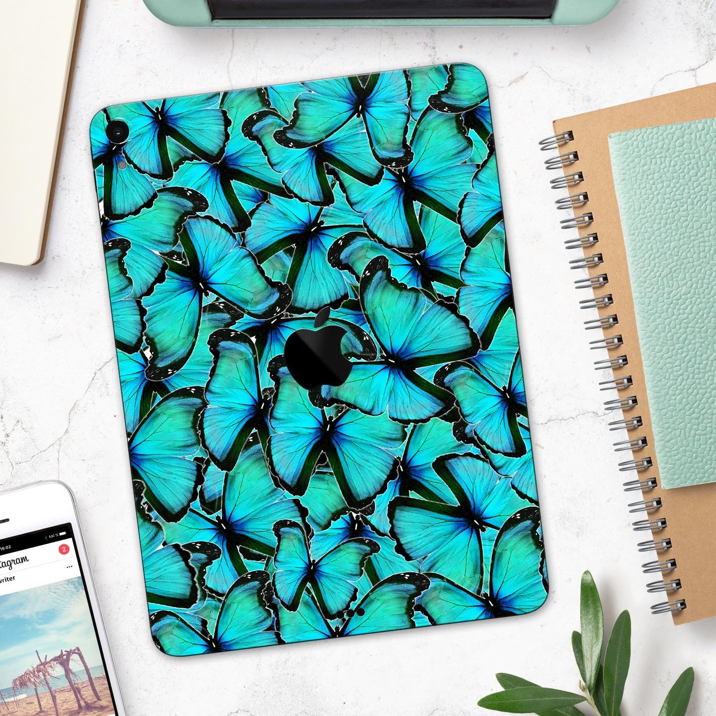 Turquoise Butterfly Bundle skin decal for Apple iPad, showcasing vibrant butterfly design and premium finish.