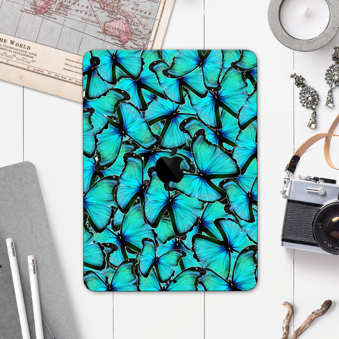 Turquoise Butterfly Bundle skin decal for Apple iPad, showcasing vibrant butterfly design and premium finish.