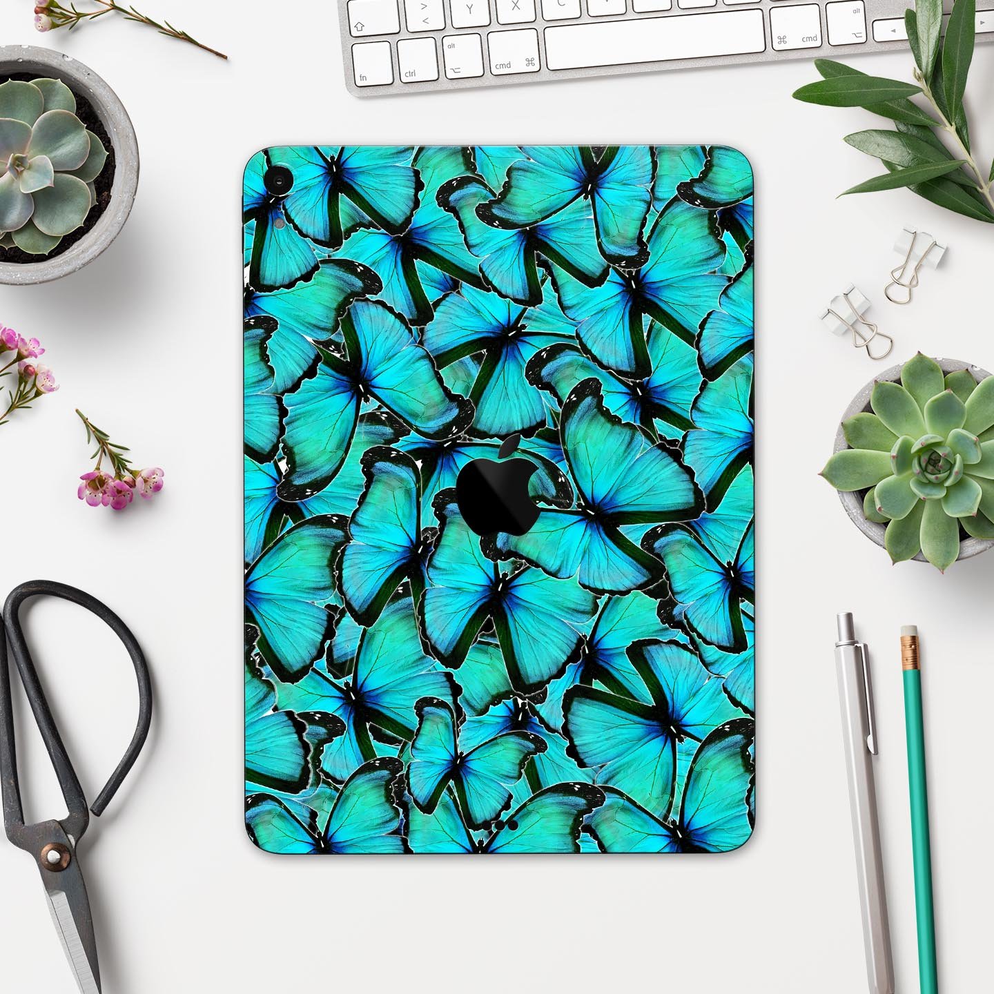 Turquoise Butterfly Bundle skin decal for Apple iPad, showcasing vibrant butterfly design and premium finish.