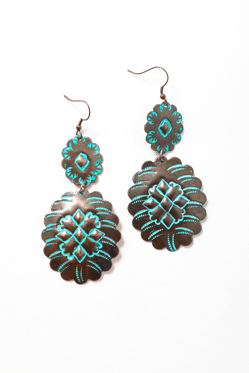 A pair of elegant turquoise flower drop earrings made from brass, showcasing a floral design with vibrant turquoise accents.