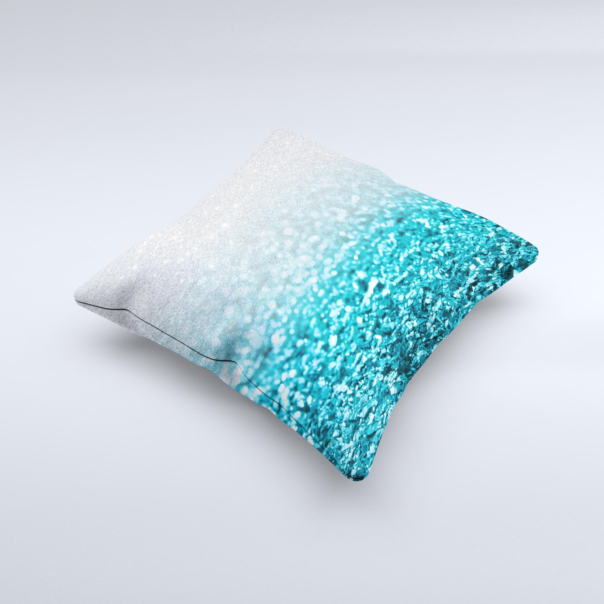 Turquoise and silver decorative throw pillow with a glimmer fade design, handcrafted in Virginia, showcasing unique imperfections.