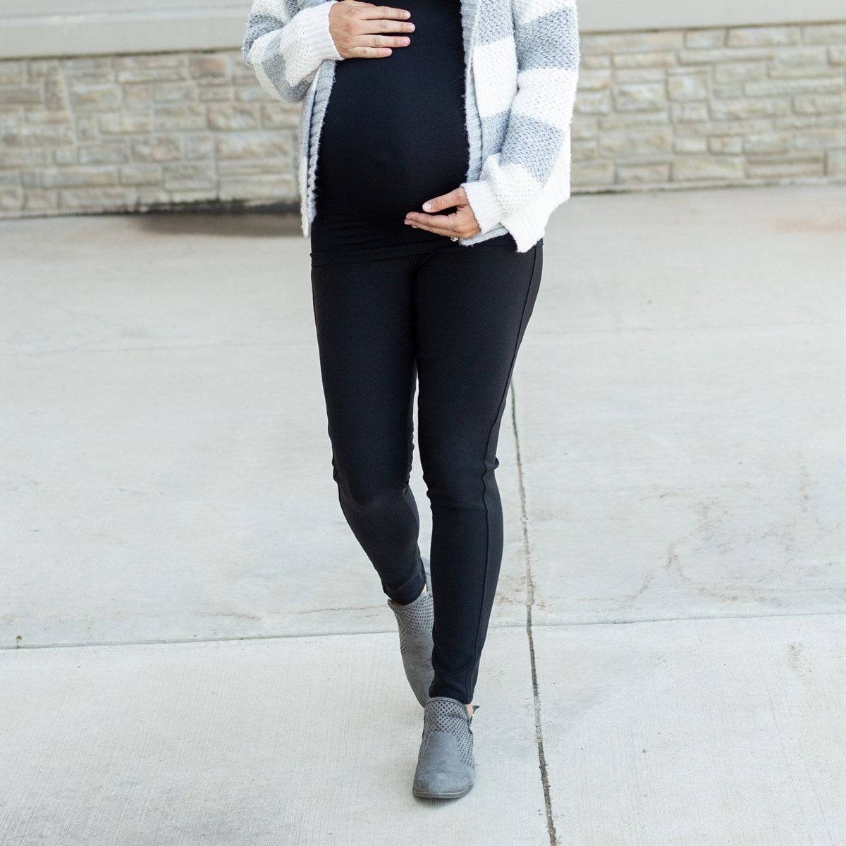 A pair of Twill Maternity Stretchy Jeggings showcasing the extra-tall waistband and seamless stretch maternity panel, perfect for stylish comfort during pregnancy.