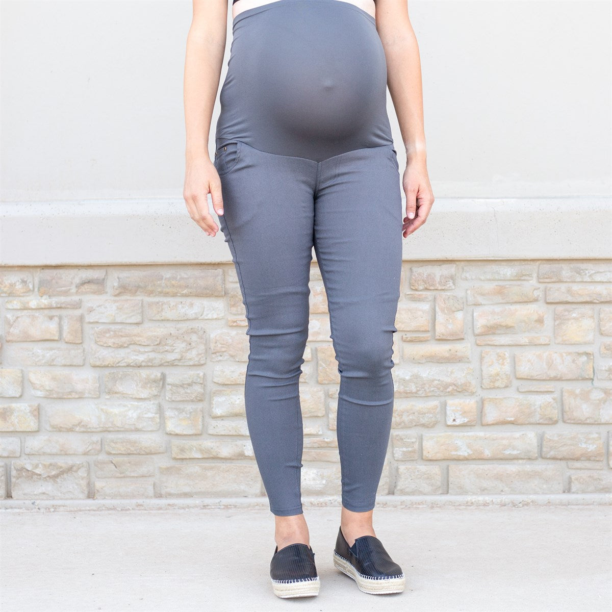 A pair of Twill Maternity Stretchy Jeggings showcasing the extra-tall waistband and seamless stretch maternity panel, perfect for stylish comfort during pregnancy.