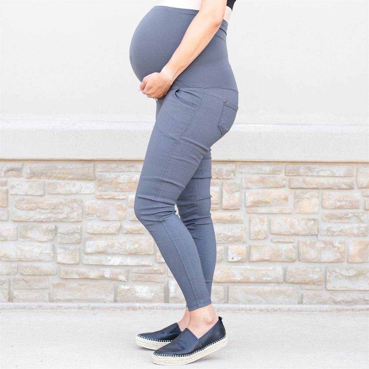 A pair of Twill Maternity Stretchy Jeggings showcasing the extra-tall waistband and seamless stretch maternity panel, perfect for stylish comfort during pregnancy.