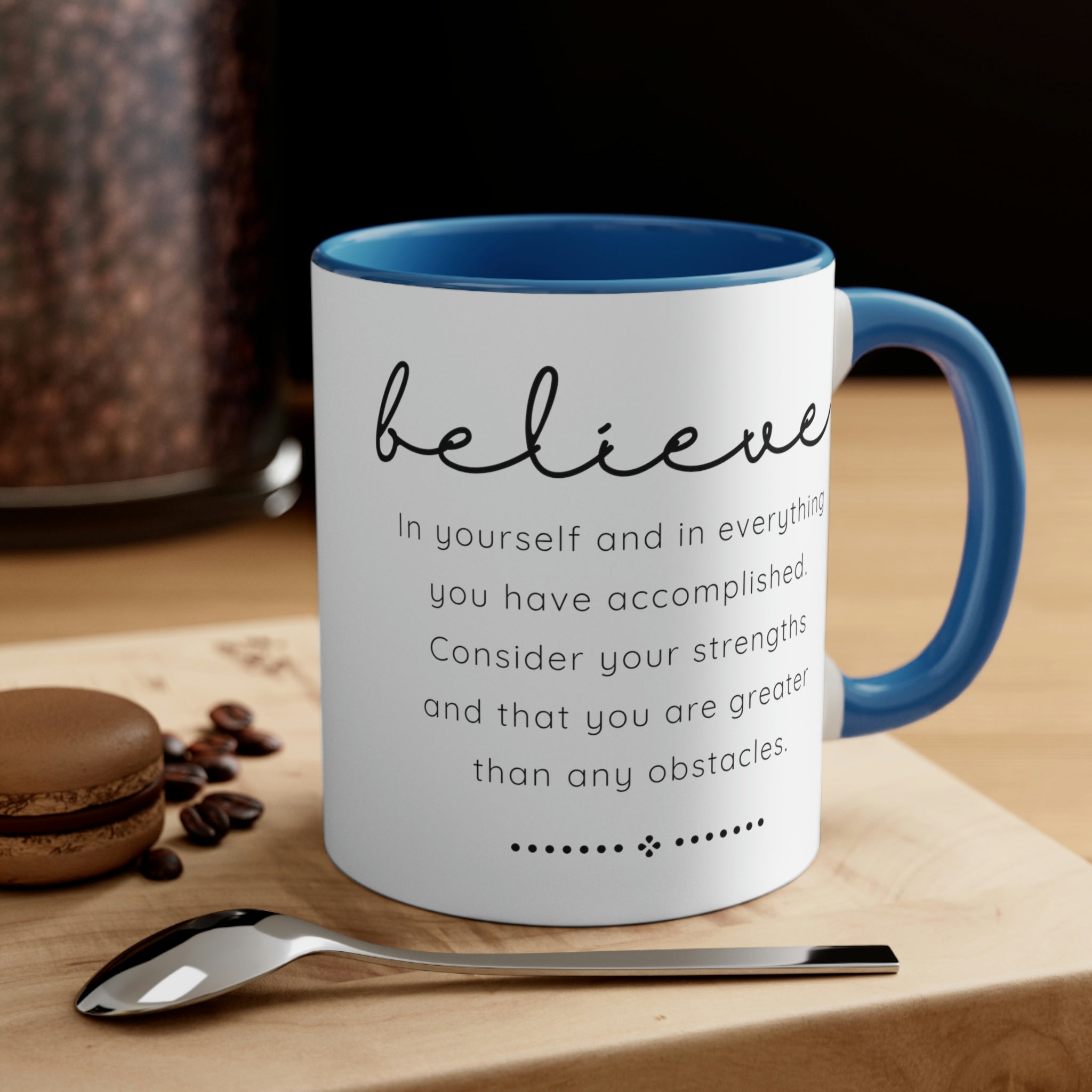 Two-tone ceramic mug with a colorful interior and handle, featuring the inspirational phrase 'Believe in Yourself'.