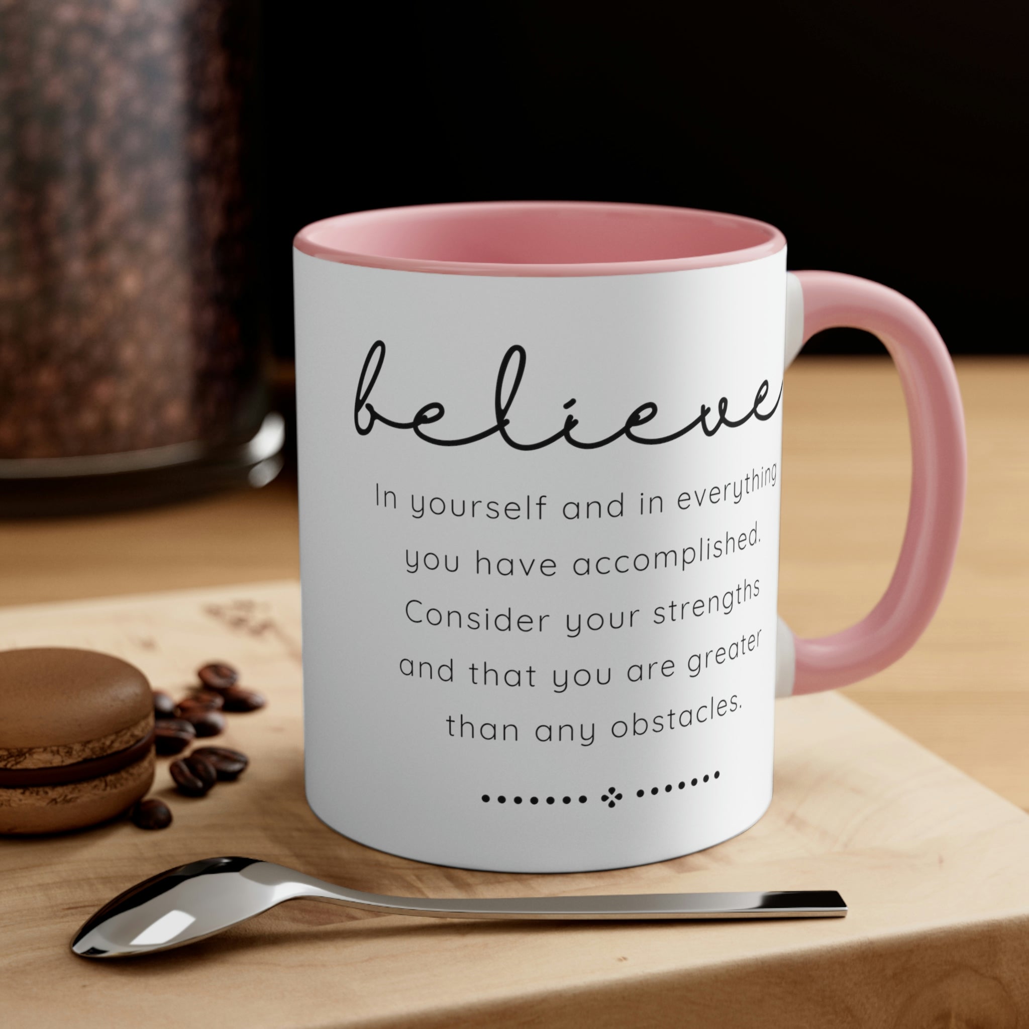 Two-tone ceramic mug with a colorful interior and handle, featuring the inspirational phrase 'Believe in Yourself'.