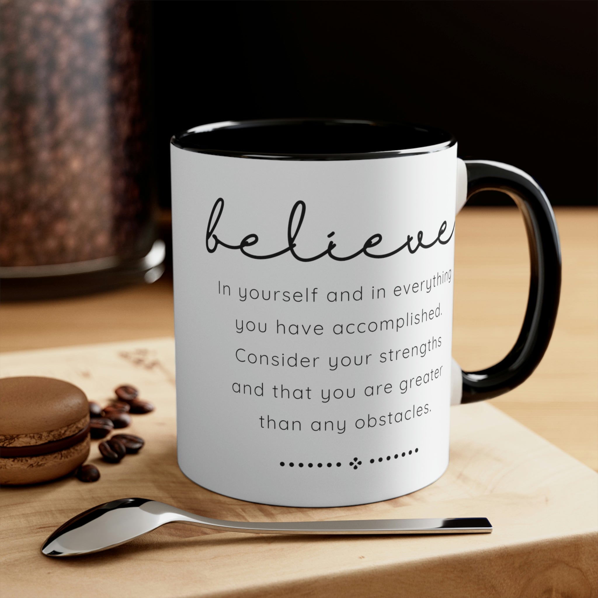 Two-tone ceramic mug with a colorful interior and handle, featuring the inspirational phrase 'Believe in Yourself'.