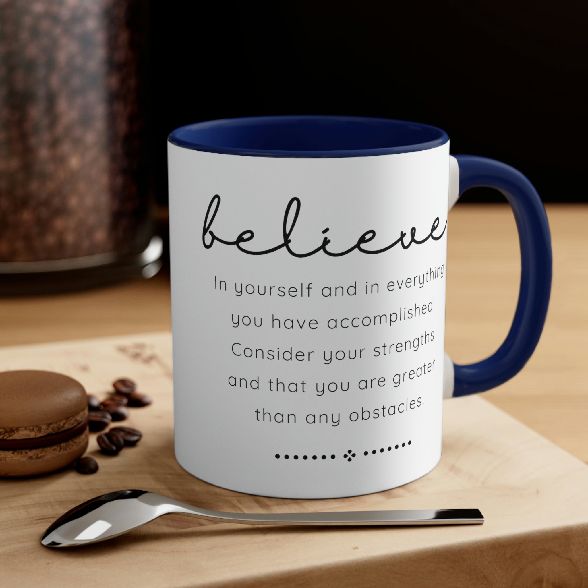 Two-tone ceramic mug with a colorful interior and handle, featuring the inspirational phrase 'Believe in Yourself'.