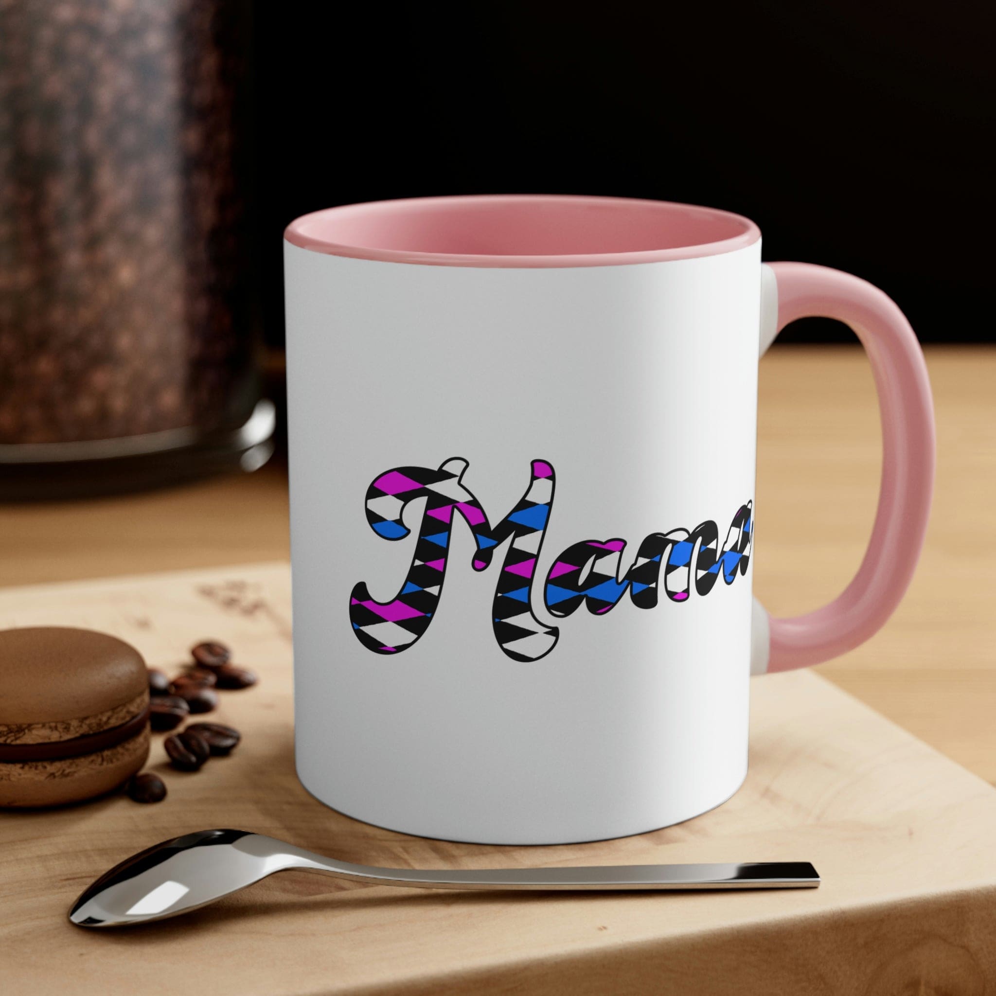 Two-tone ceramic mug with checkered pink, white, and blue design, featuring a comfortable C-handle and vibrant interior.