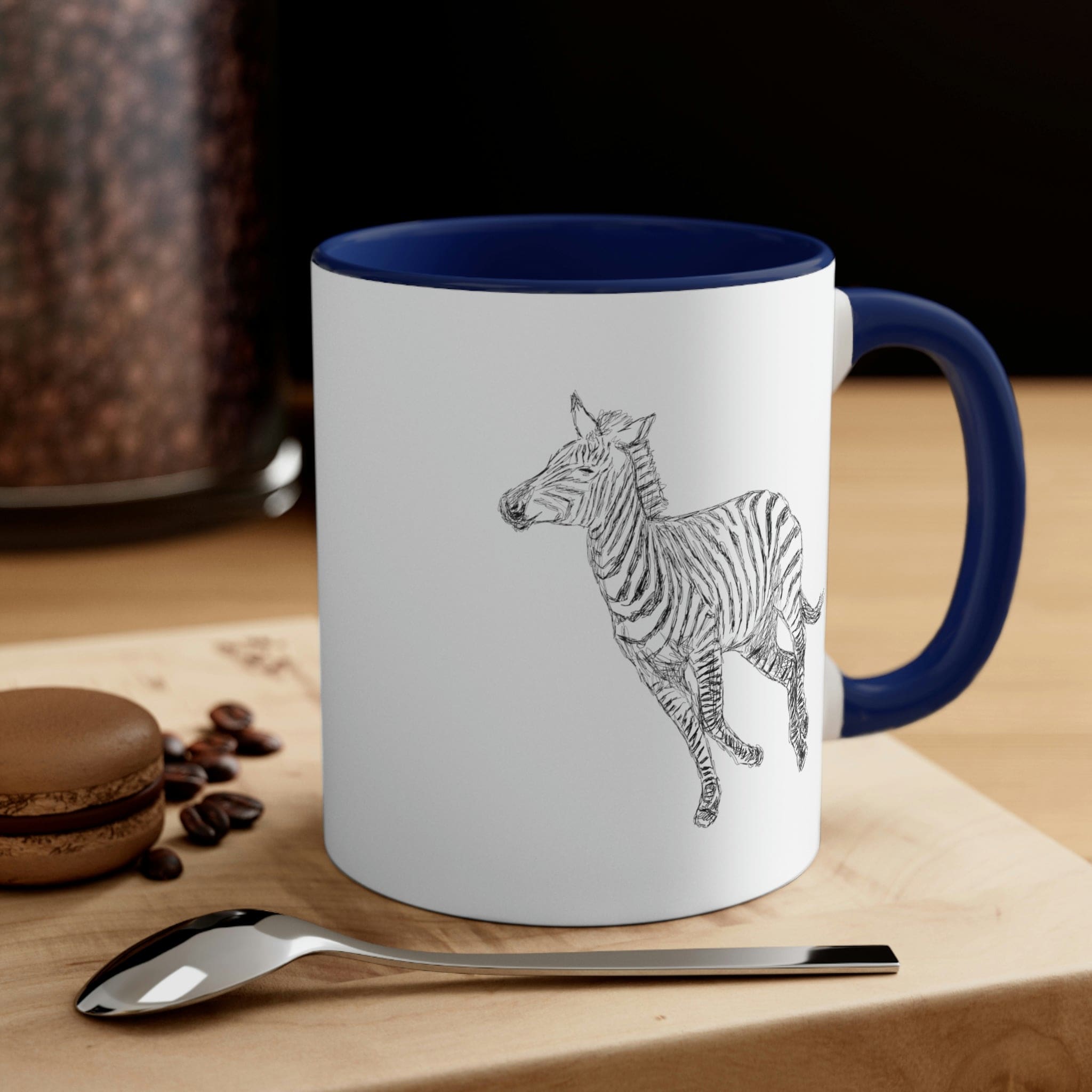 Two-tone ceramic mug with Galloping Zebra line art, featuring a colored interior and C-handle for comfortable use.