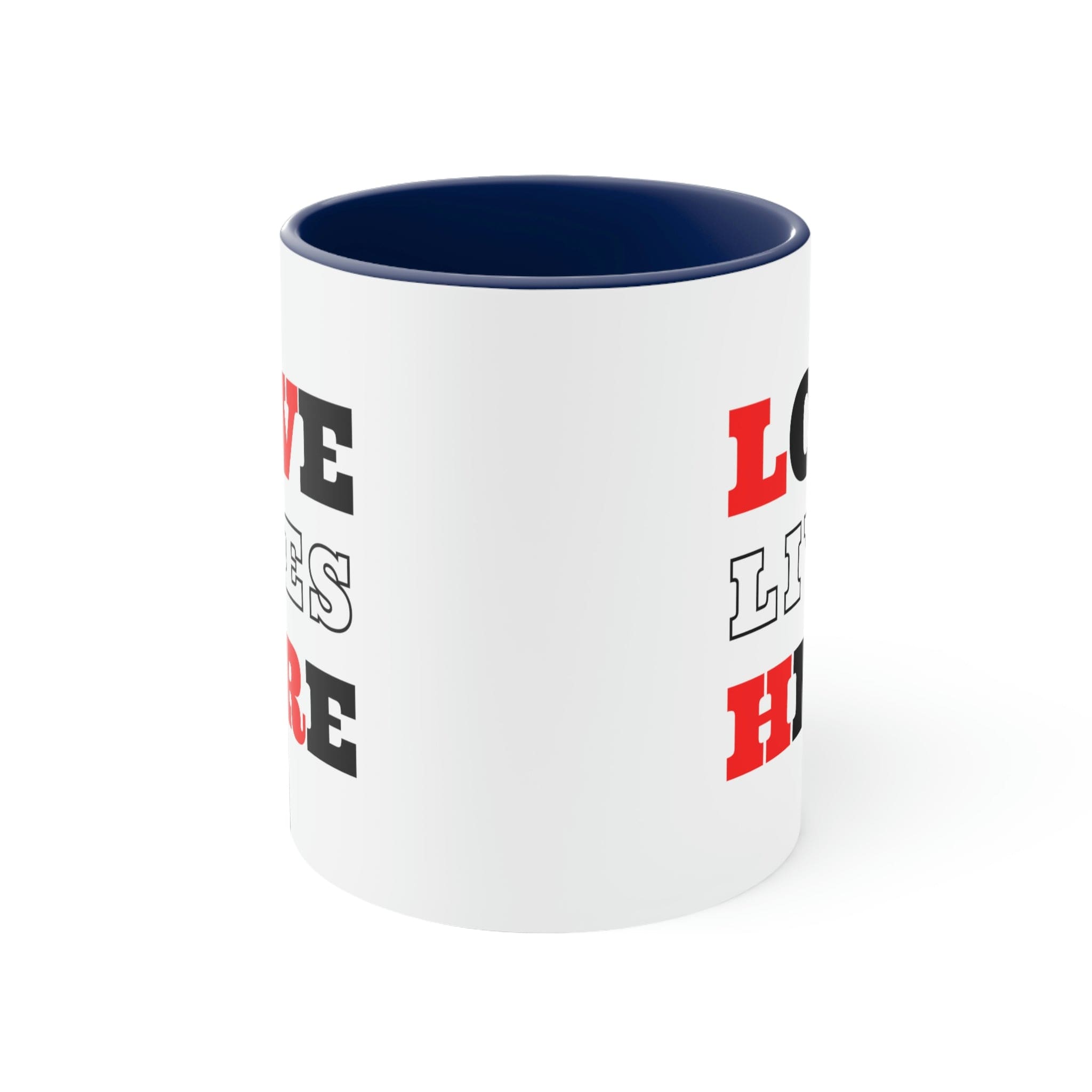 Two-tone ceramic mug with a white exterior and colored interior, featuring a comfortable C-handle and the phrase 'Love Lives Here'.