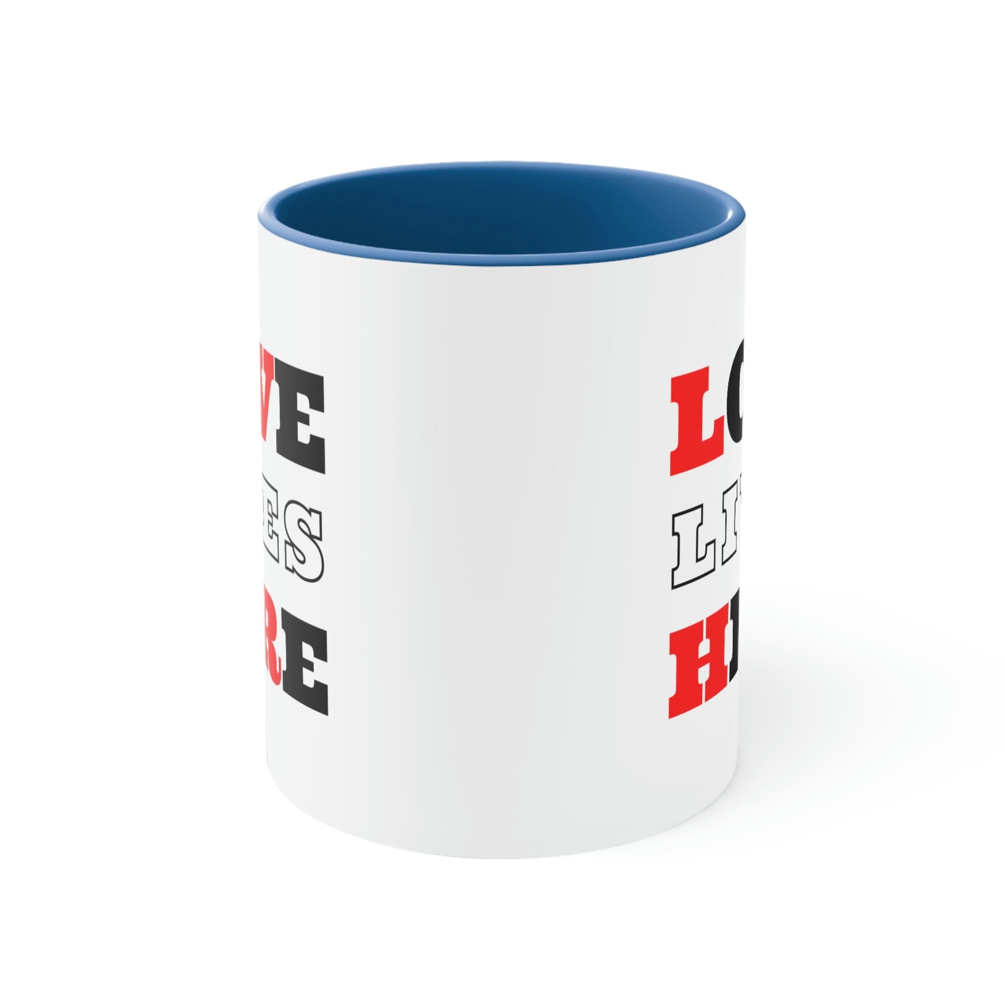 Two-tone ceramic mug with a white exterior and colored interior, featuring a comfortable C-handle and the phrase 'Love Lives Here'.