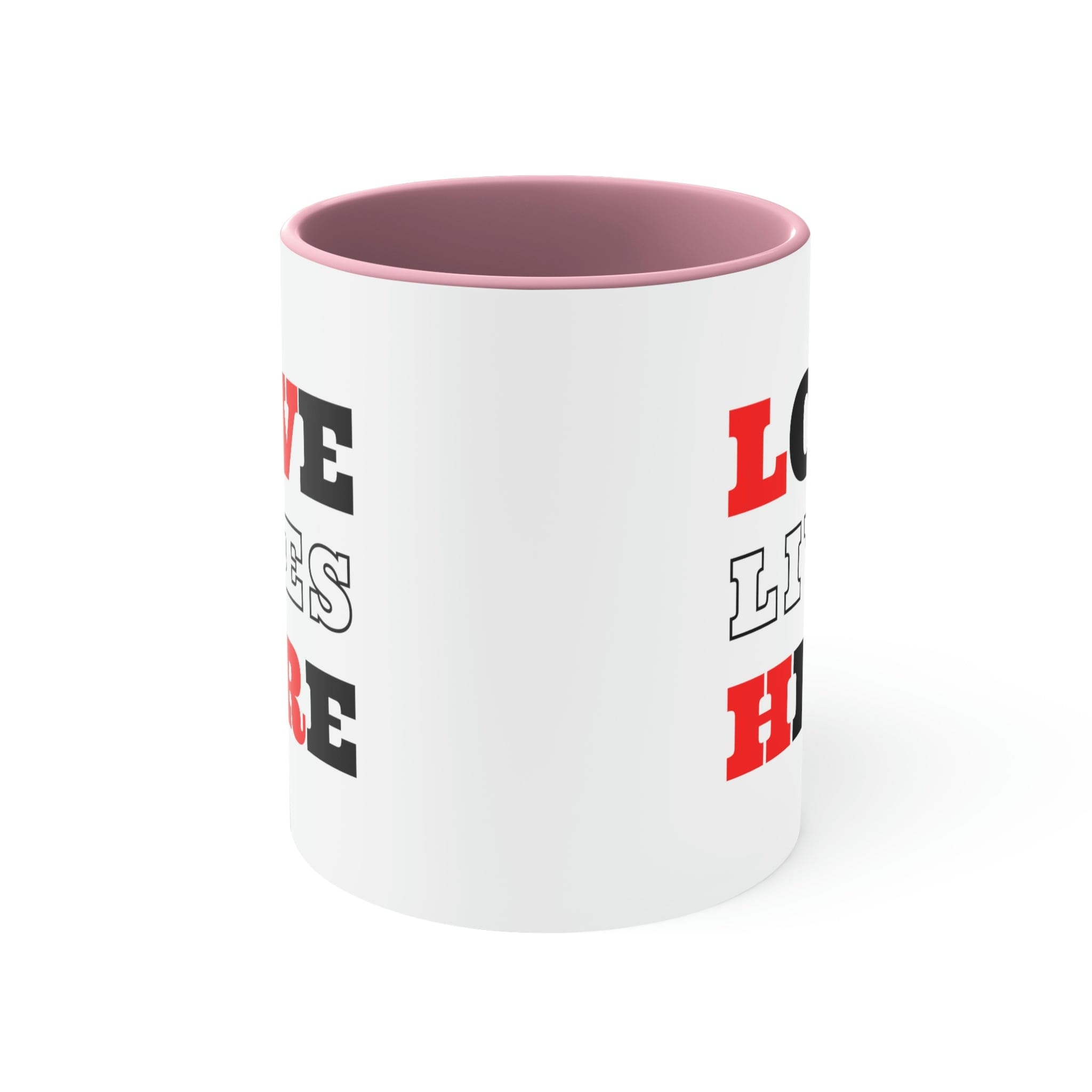 Two-tone ceramic mug with a white exterior and colored interior, featuring a comfortable C-handle and the phrase 'Love Lives Here'.