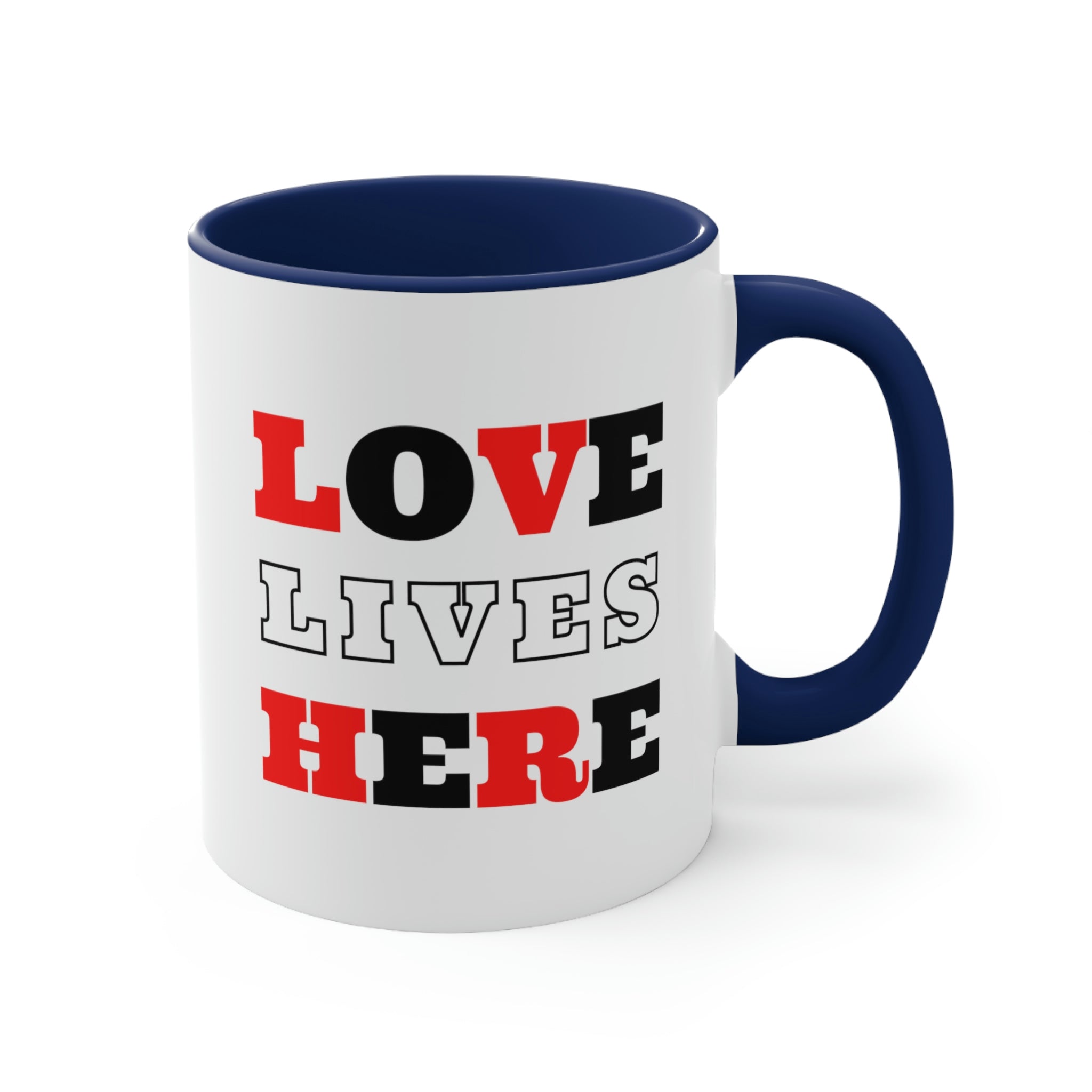 Two-tone ceramic mug with a white exterior and colored interior, featuring a comfortable C-handle and the phrase 'Love Lives Here'.