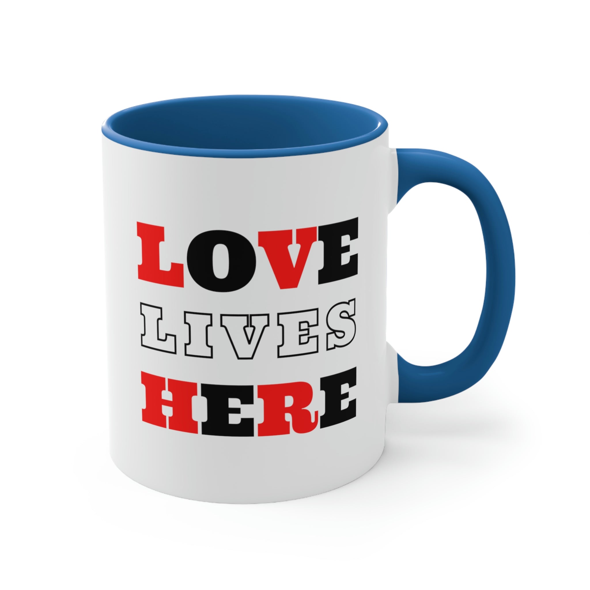 Two-tone ceramic mug with a white exterior and colored interior, featuring a comfortable C-handle and the phrase 'Love Lives Here'.