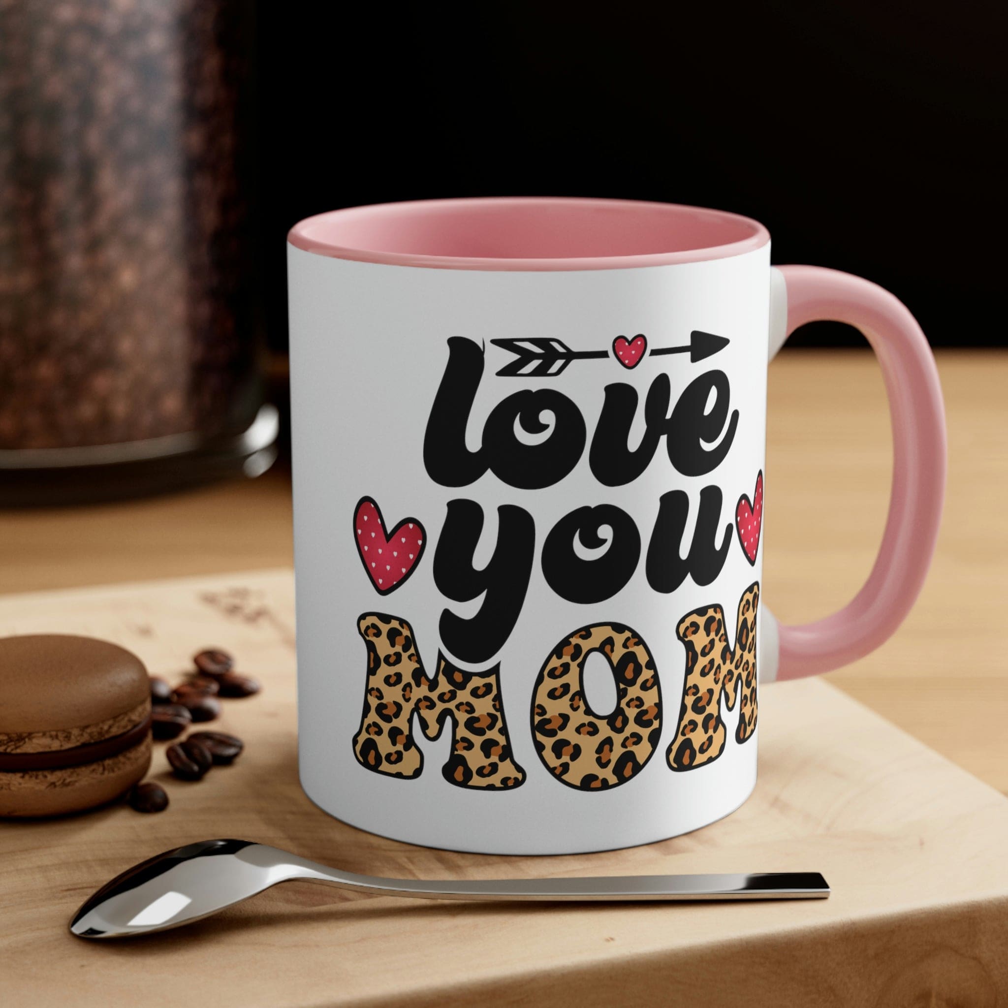 Two-tone ceramic mug with 'Love you Mom' illustration, featuring a colorful interior and comfortable C-handle.