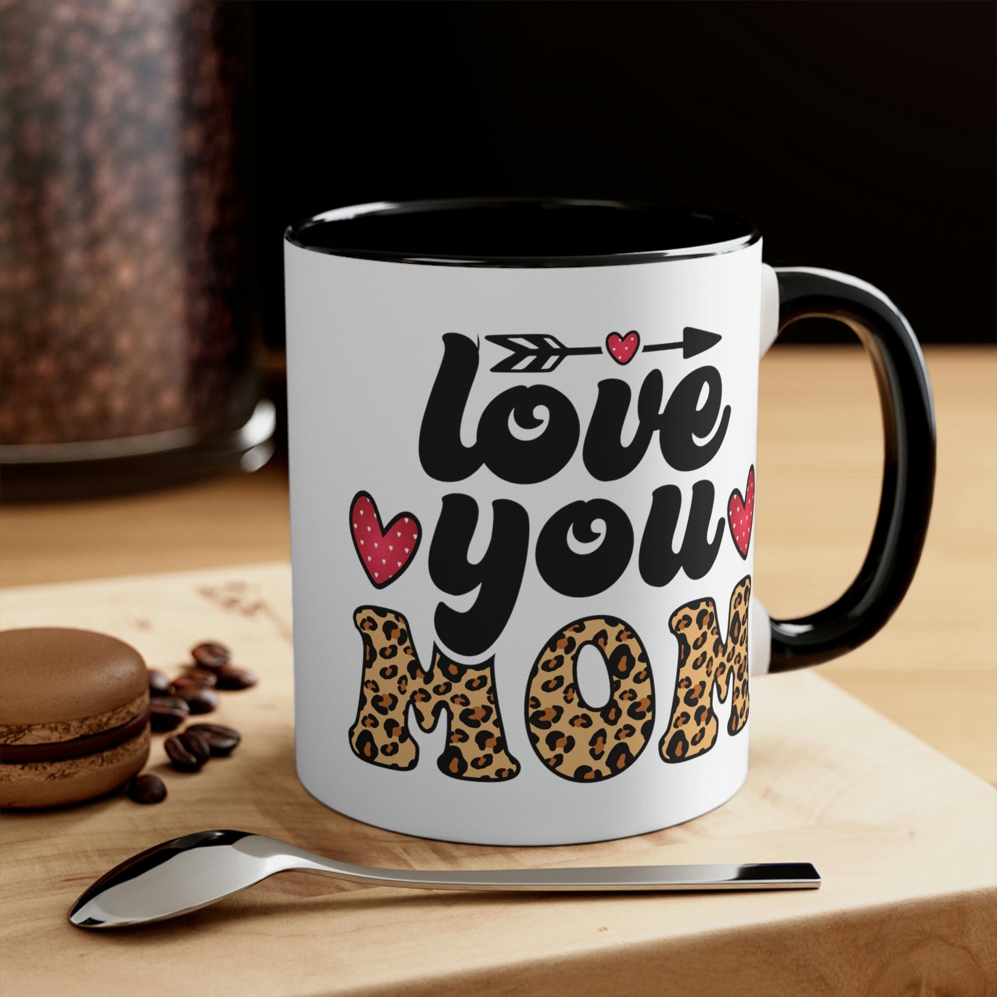 Two-tone ceramic mug with 'Love you Mom' illustration, featuring a colorful interior and comfortable C-handle.