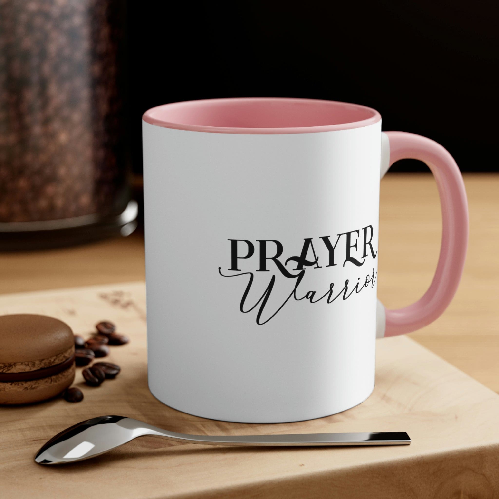 Two-tone ceramic mug with Prayer Warrior illustration and comfortable C-handle, showcasing vibrant colors.