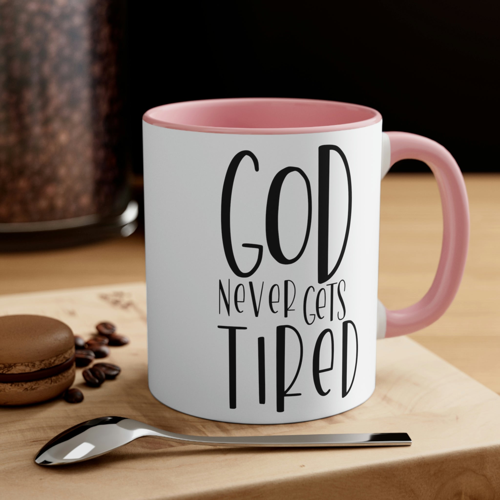 Two-tone ceramic mug with a white exterior and colored interior, featuring a comfortable C-handle and motivational design.