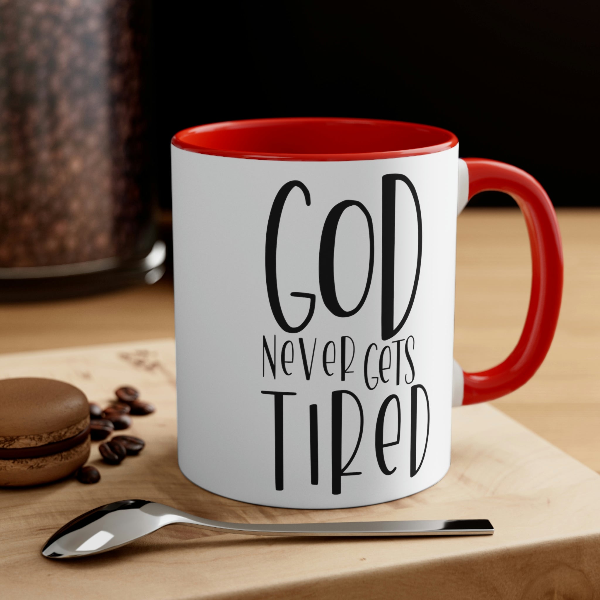 Two-tone ceramic mug with a white exterior and colored interior, featuring a comfortable C-handle and motivational design.