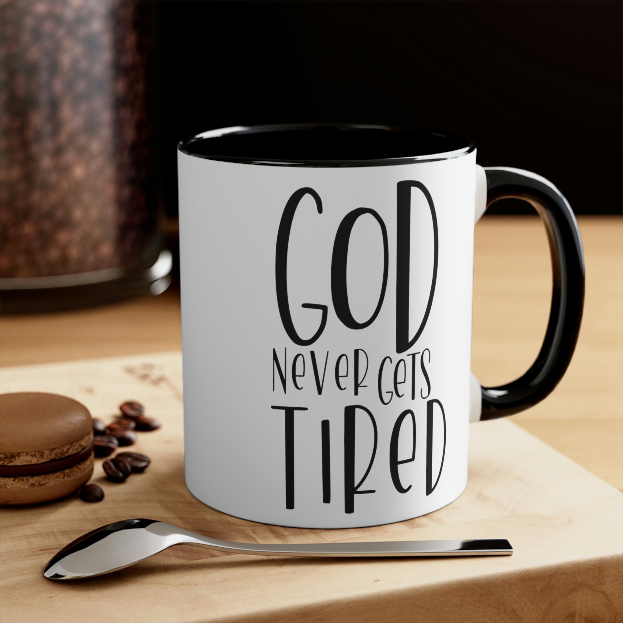 Two-tone ceramic mug with a white exterior and colored interior, featuring a comfortable C-handle and motivational design.