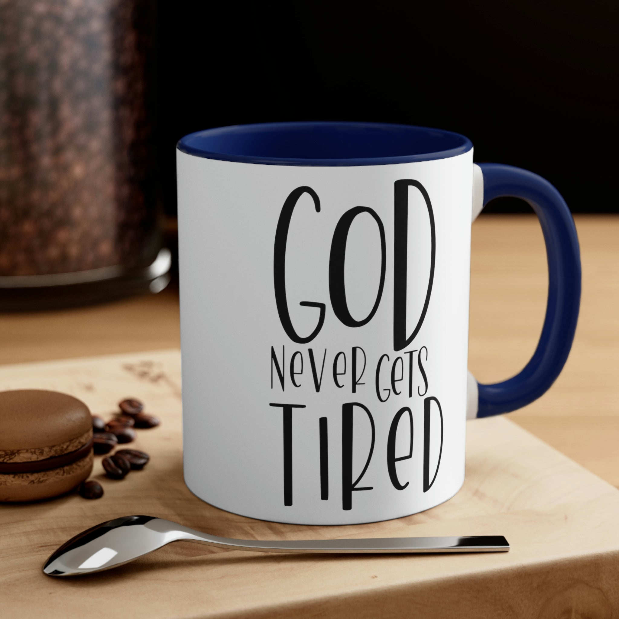 Two-tone ceramic mug with a white exterior and colored interior, featuring a comfortable C-handle and motivational design.