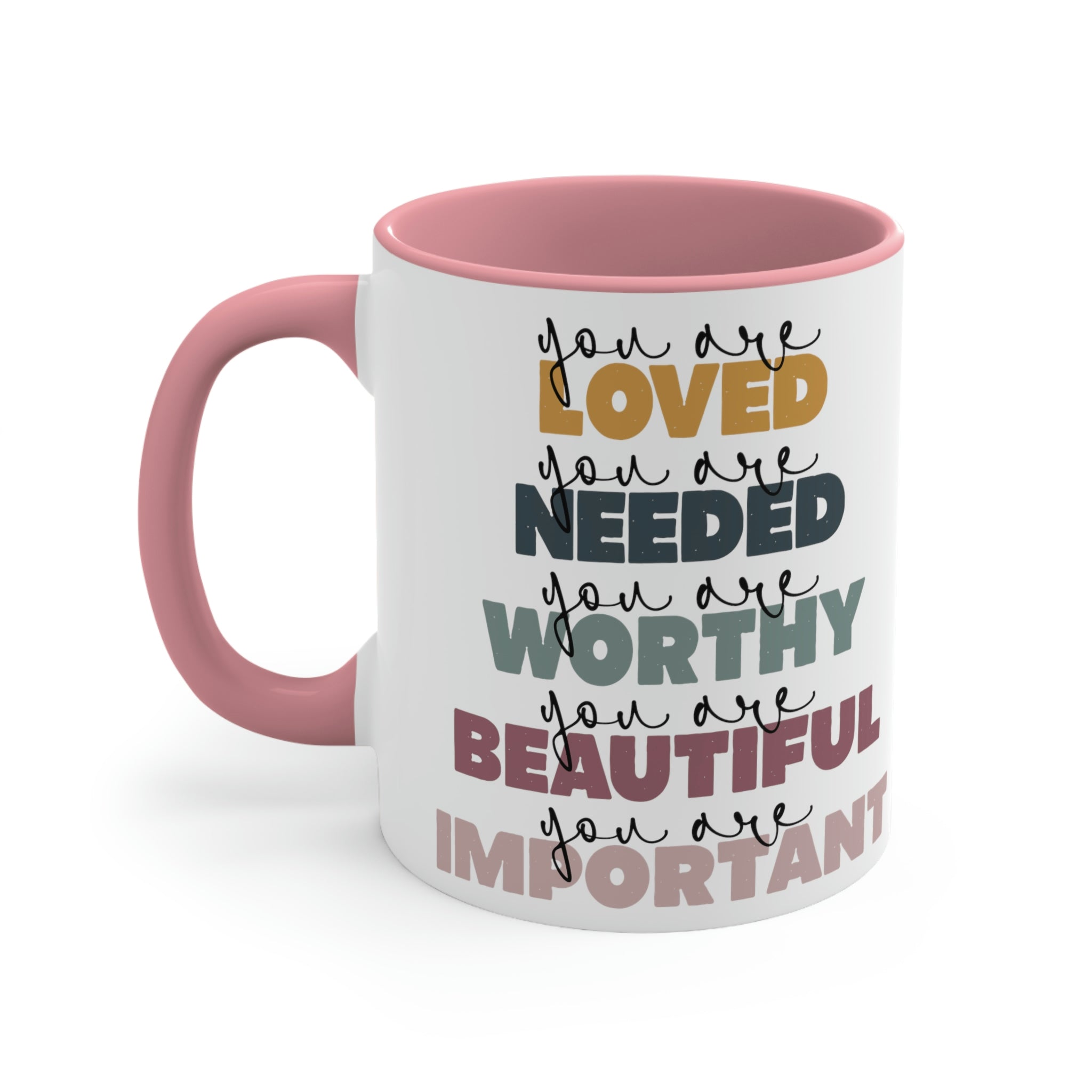 Two-tone ceramic mug with a white exterior and colored interior, featuring a C-handle and the phrase 'you are Loved'.