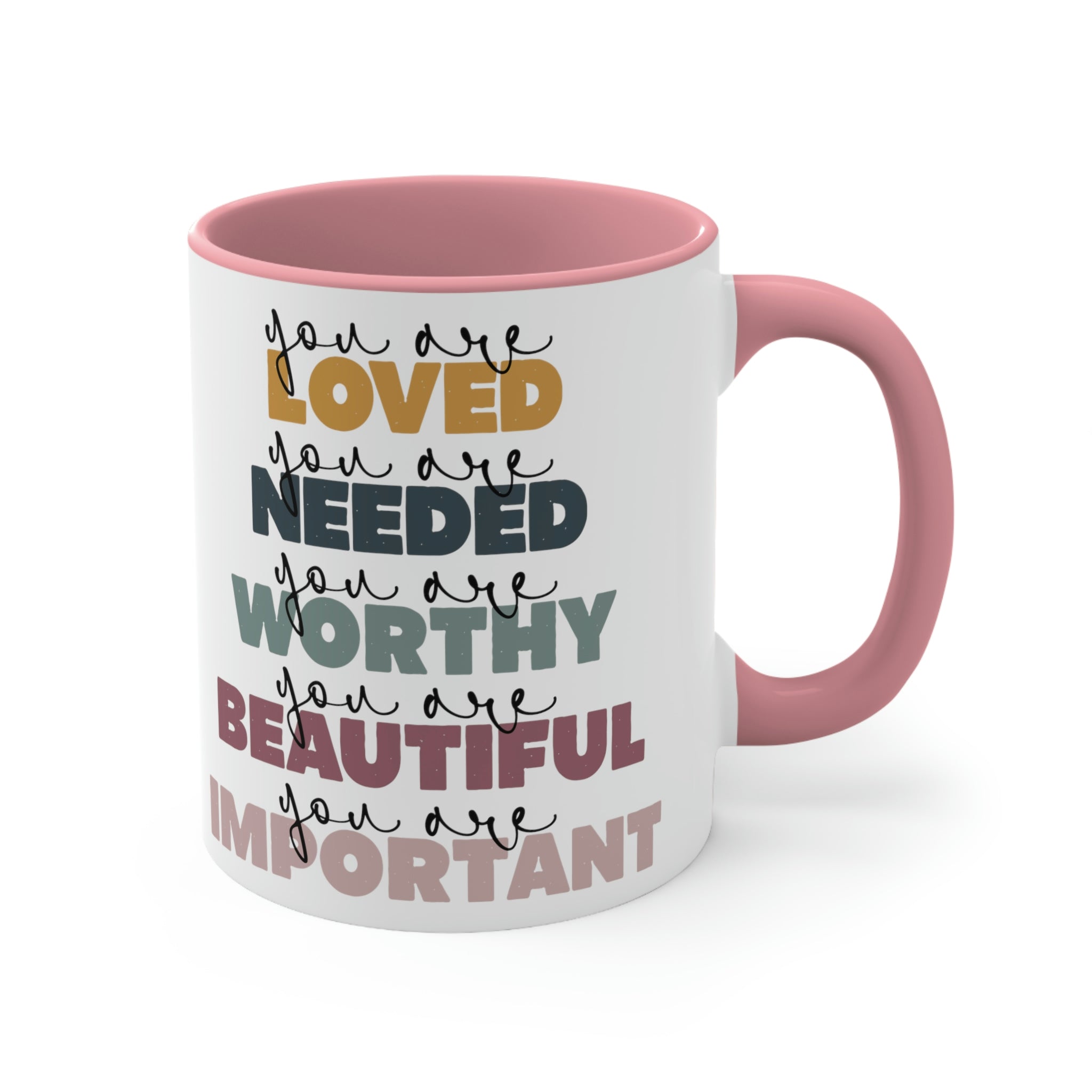 Two-tone ceramic mug with a white exterior and colored interior, featuring a C-handle and the phrase 'you are Loved'.