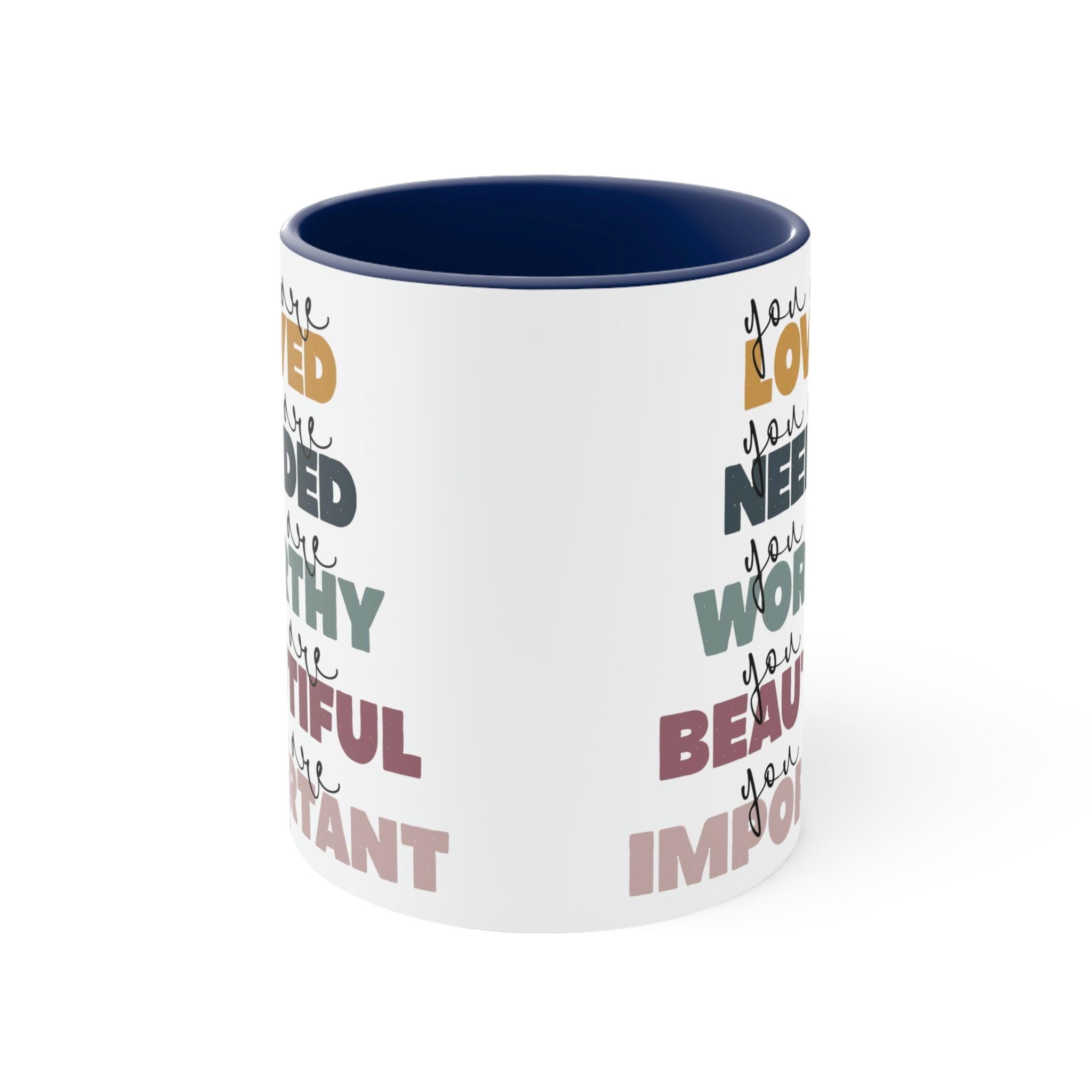 Two-tone ceramic mug with a white exterior and colored interior, featuring a C-handle and the phrase 'you are Loved'.