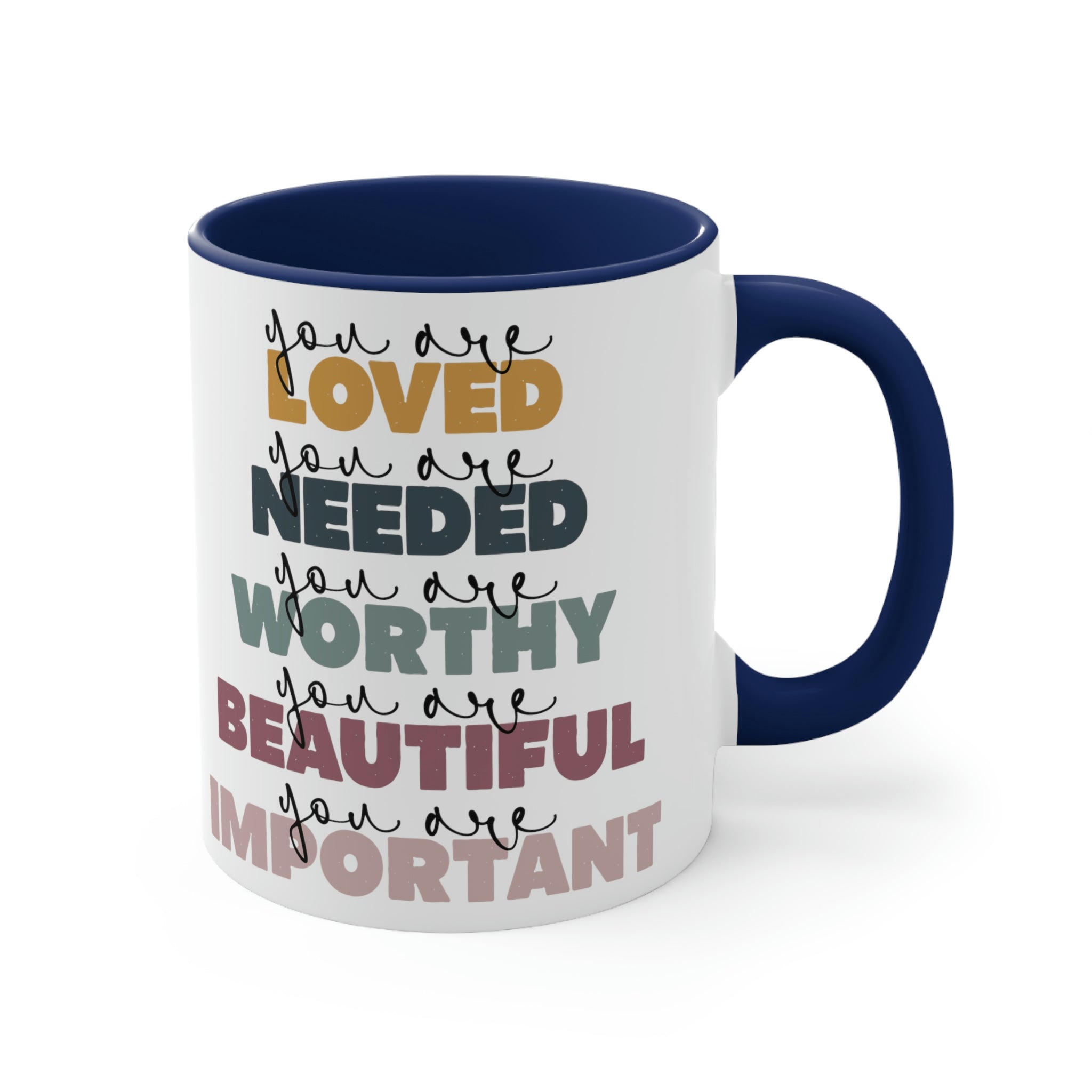 Two-tone ceramic mug with a white exterior and colored interior, featuring a C-handle and the phrase 'you are Loved'.