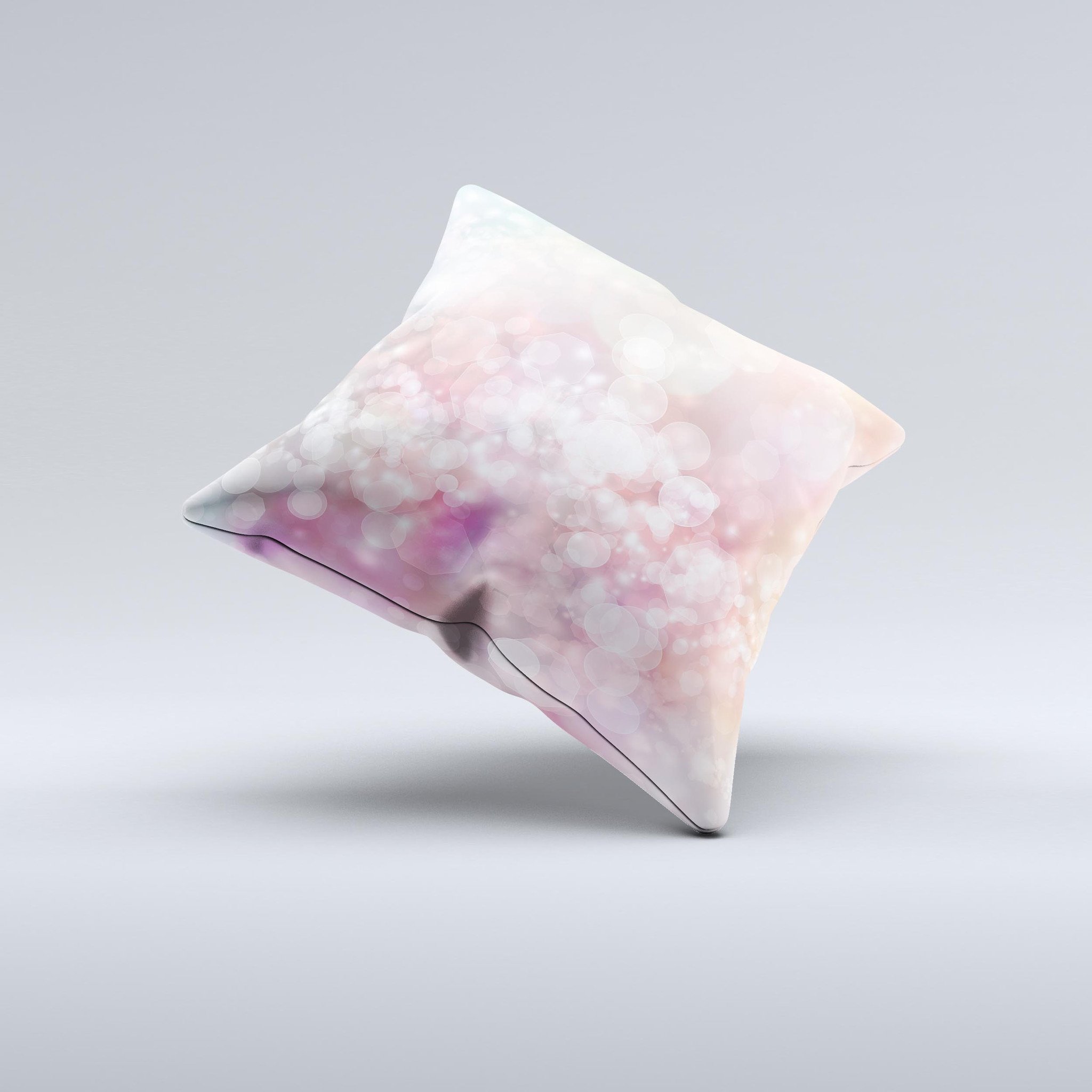 A handcrafted decorative throw pillow featuring unfocused pink abstract lights design, showcasing unique imperfections.