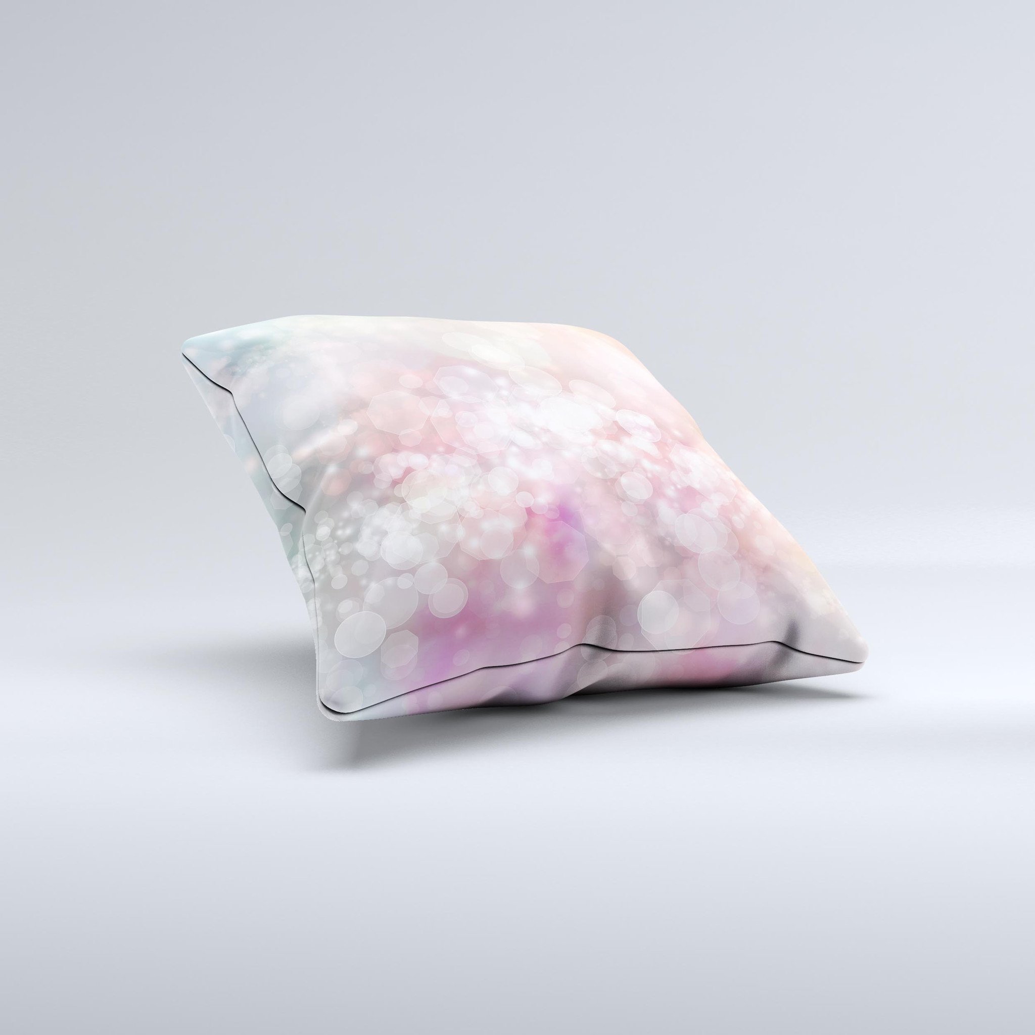 A handcrafted decorative throw pillow featuring unfocused pink abstract lights design, showcasing unique imperfections.