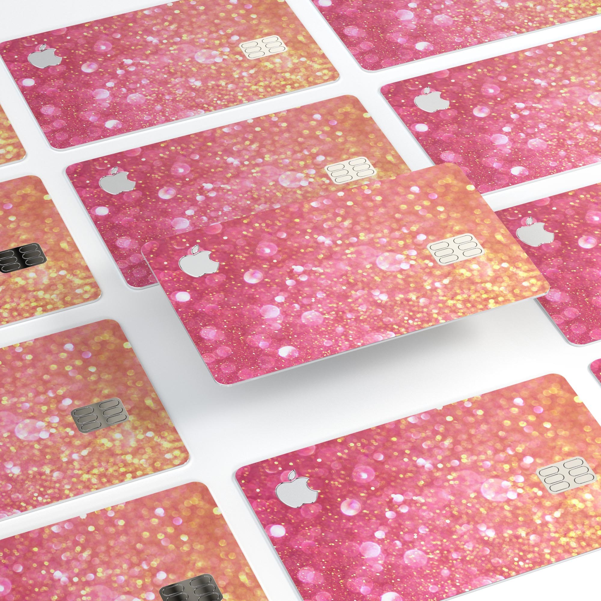 Unfocused Pink and Gold Orbs skin kit for Apple Card, showcasing vibrant colors and premium vinyl material.