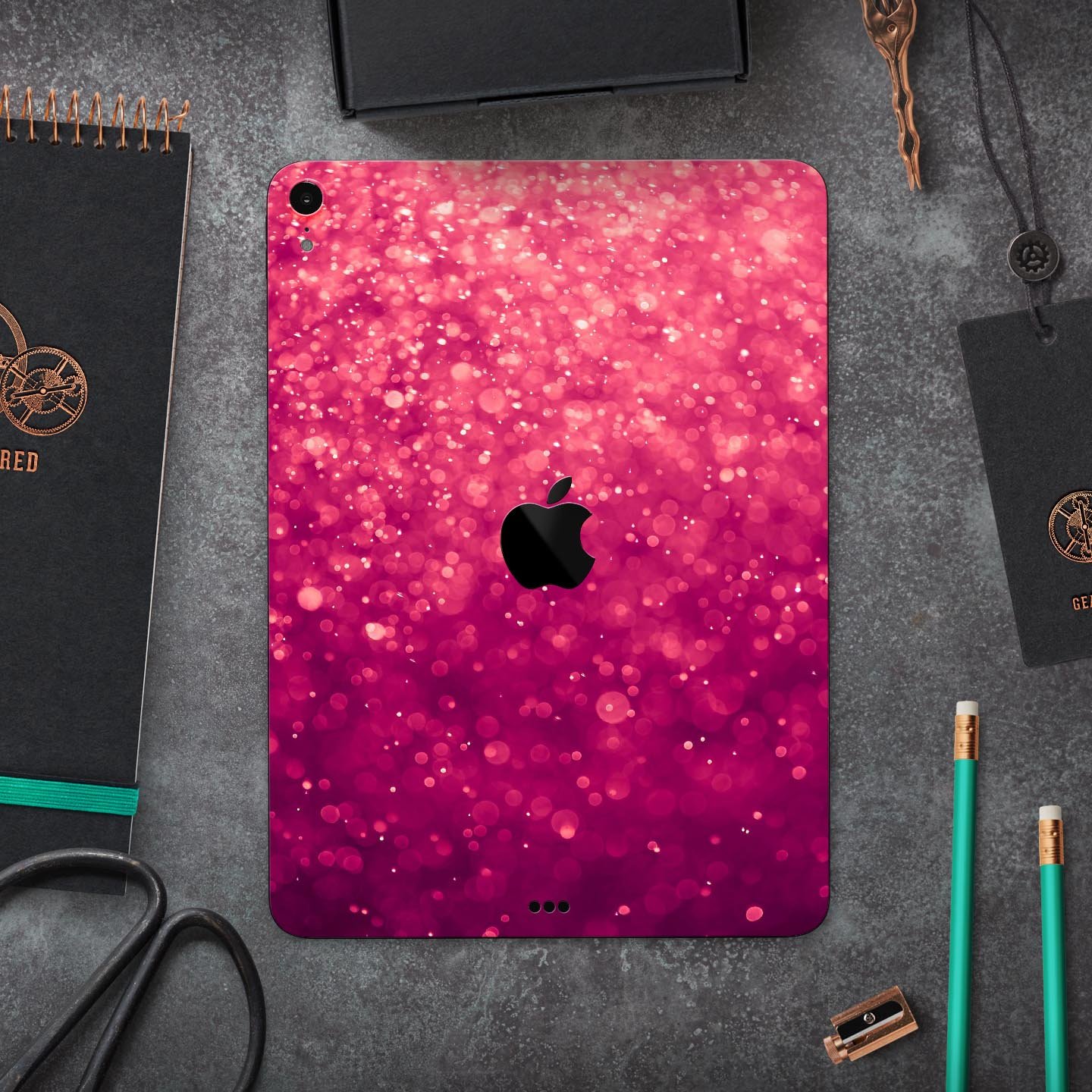 Unfocused Pink Glimmer Full Body Skin Decal for Apple iPad Pro, showcasing a stylish pink design with a glossy finish.