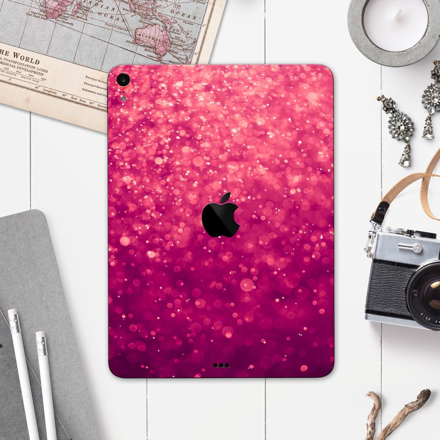 Unfocused Pink Glimmer Full Body Skin Decal for Apple iPad Pro, showcasing a stylish pink design with a glossy finish.