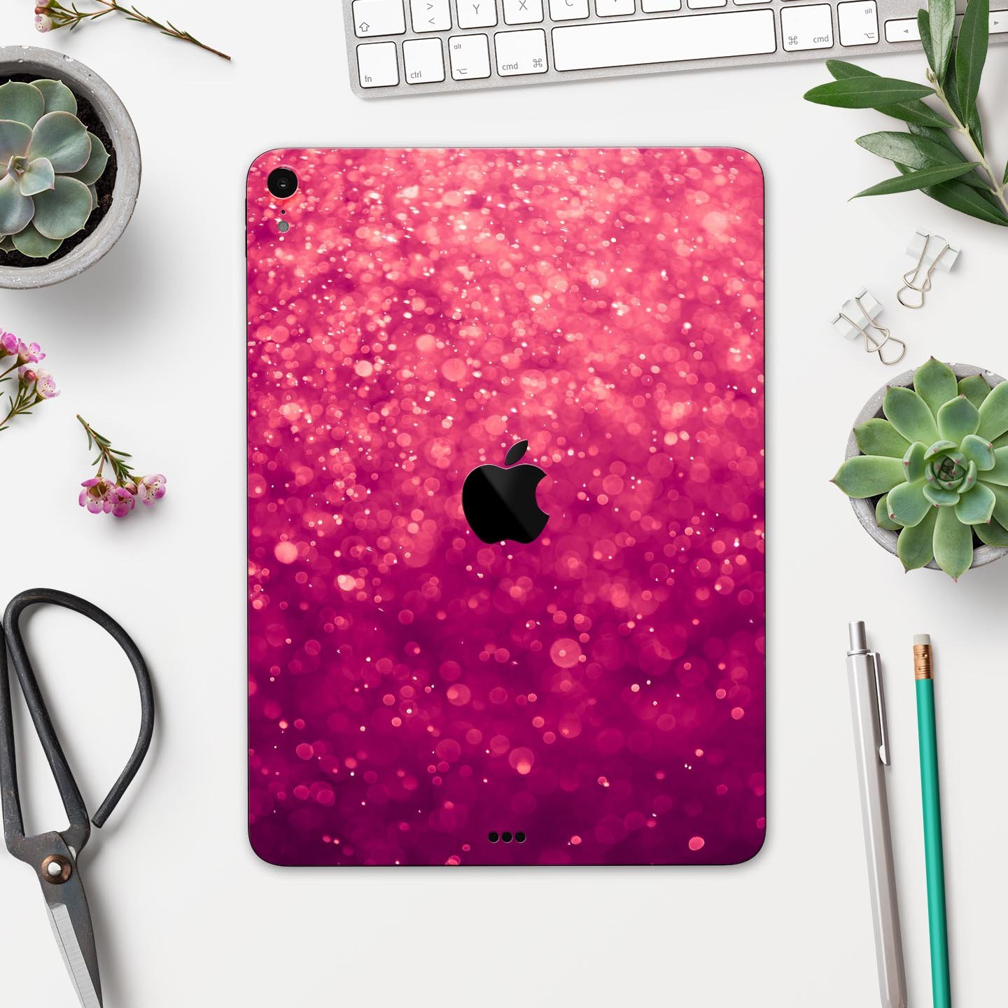 Unfocused Pink Glimmer Full Body Skin Decal for Apple iPad Pro, showcasing a stylish pink design with a glossy finish.